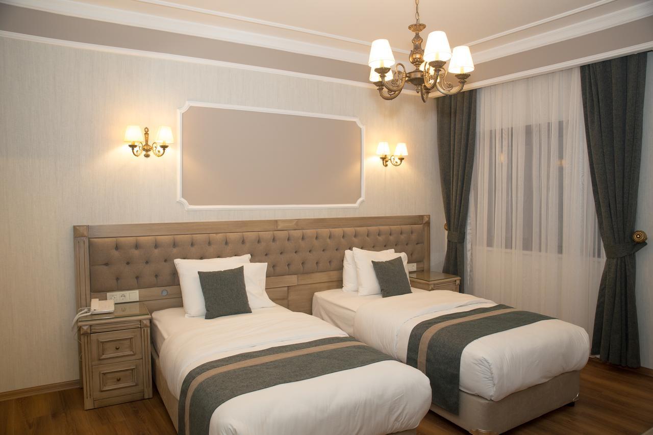 Hotel Ahmet Efendi Konagi Estambul Exterior foto A bedroom at the hotel