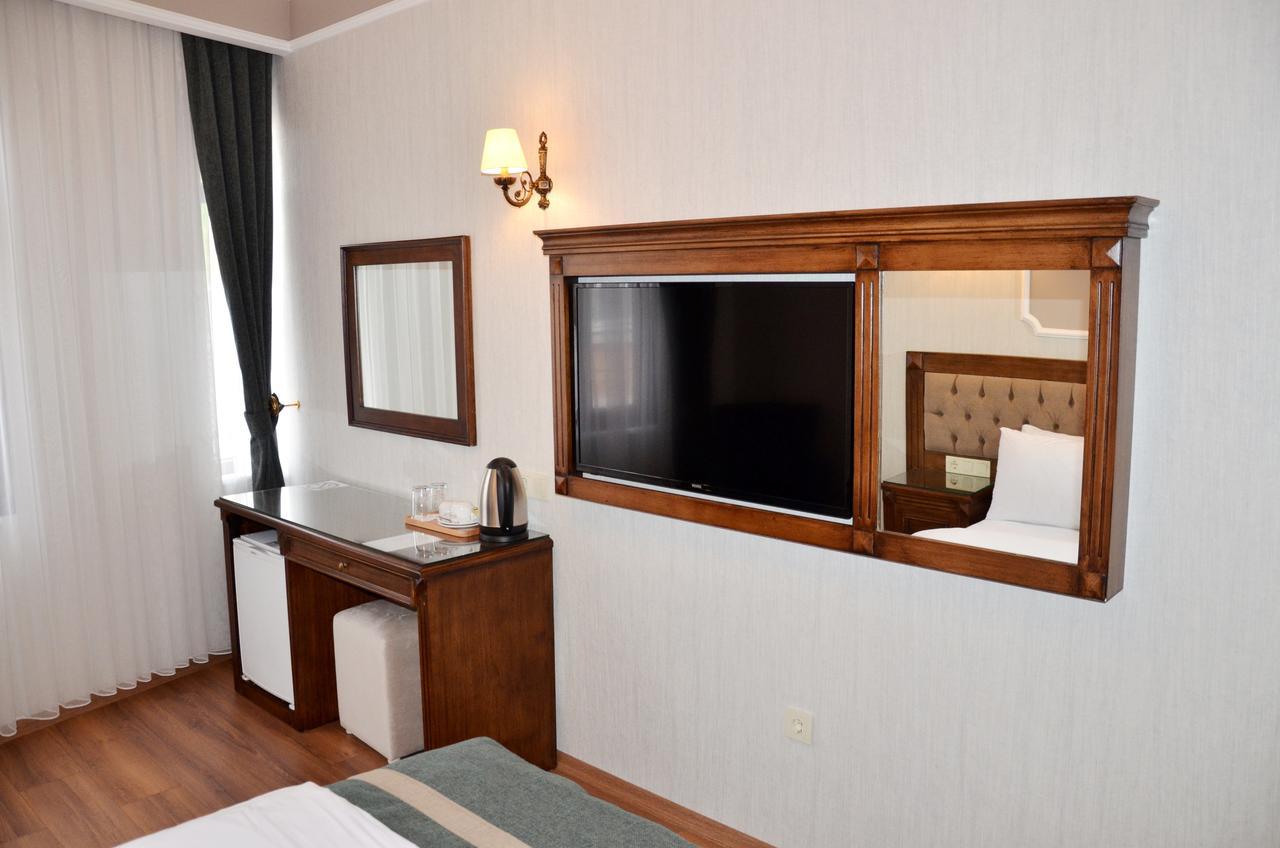 Hotel Ahmet Efendi Konagi Estambul Exterior foto A room at the hotel